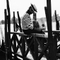 Gondolier reading the newspaper, Venice 2009
