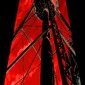 Water tower against flame sky