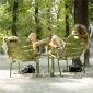 Young women tanning in the sun at the park