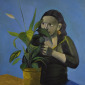 Woman behind the plant