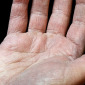 Older hand reaching