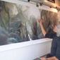 Artist working on Heart of Humanity.
